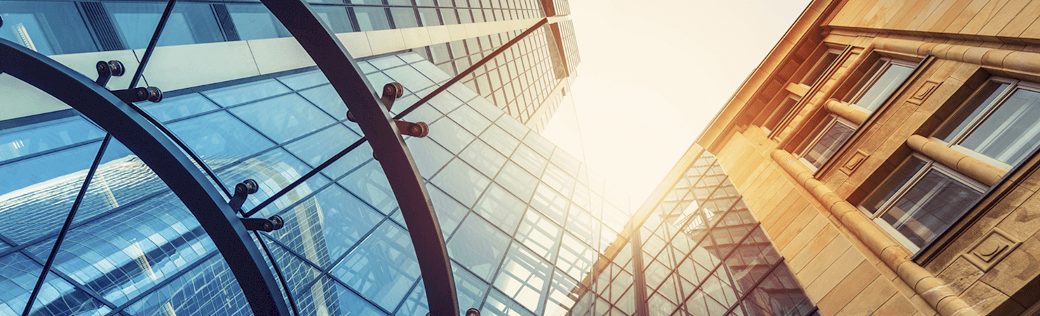View of skyscrapers from street level.
